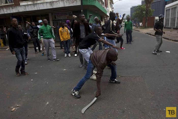 Массовые беспорядки из-за трудовых мигрантов в ЮАР (30 фото)