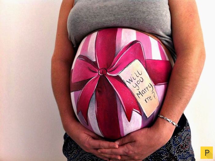 Необычные рисунки на животах беременных женщин (10 фото)