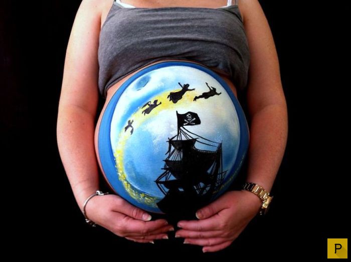 Необычные рисунки на животах беременных женщин (10 фото)